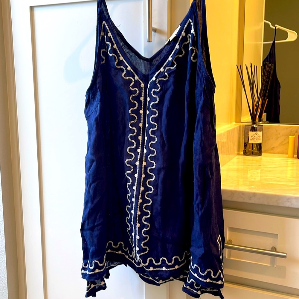 Navy, flowy top.